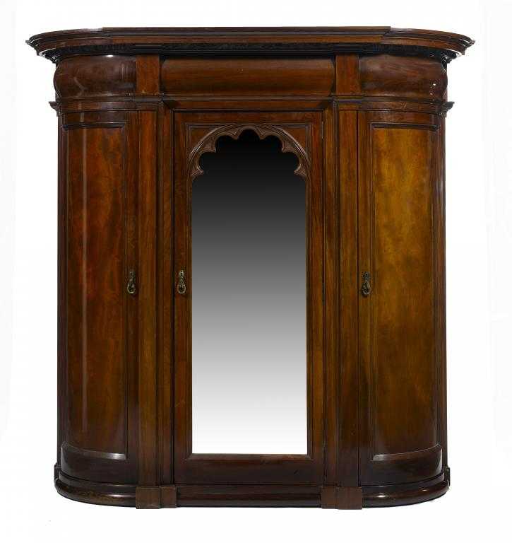 Appraisal: A VICTORIAN MAHOGANY WARDROBE the widely projecting and stepped cornice