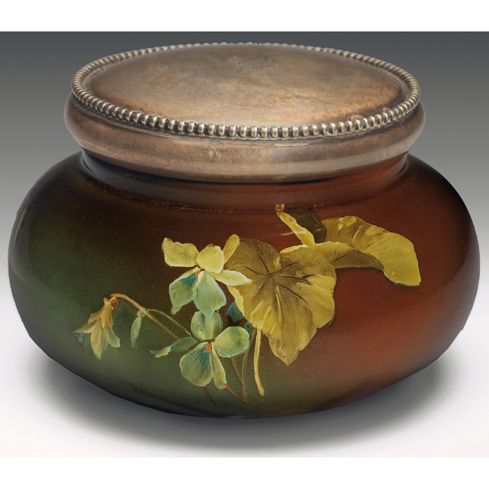 Appraisal: Rookwood covered jar Standard glaze with pansies sterling lid with