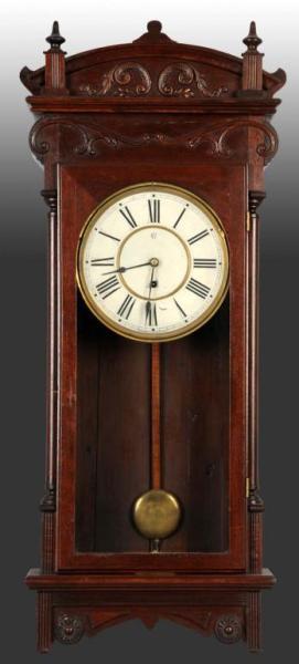 Appraisal: Waterbury Wall Clock Description Time only Includes pendulum and key