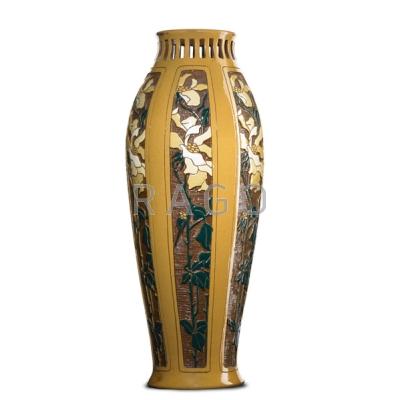 Appraisal: ROSEVILLE Tall and rare Della Robbia vase with wild roses