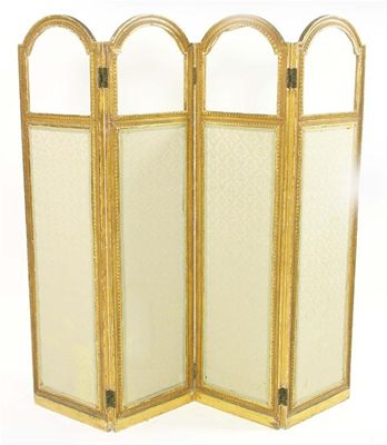 Appraisal: A gilt and gesso four fold commode screen the arched