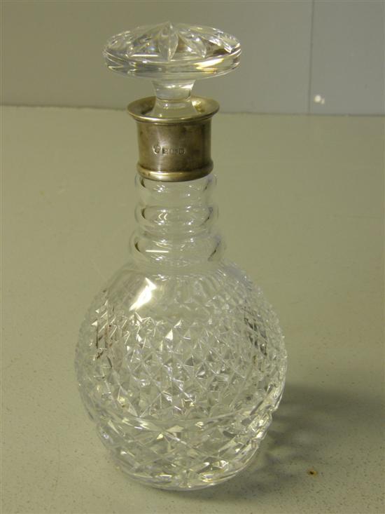 Appraisal: Modern silver mounted glass decanter with three ring neck and