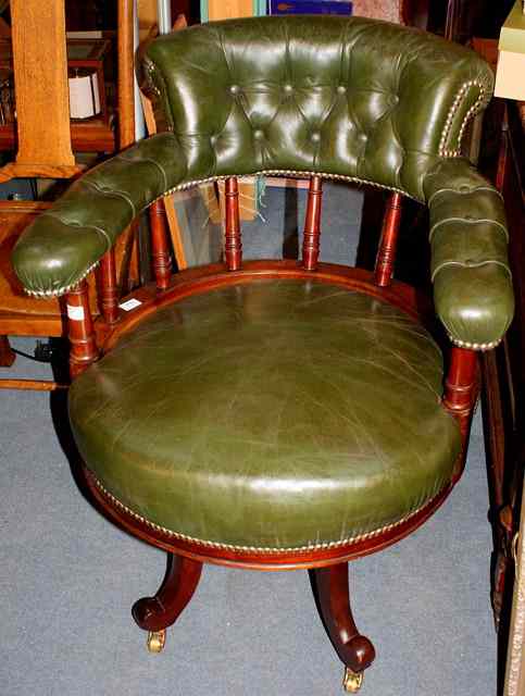 Appraisal: A VICTORIAN BUTTONED AND UPHOLSTERED TUB SHAPED DESK CHAIR the