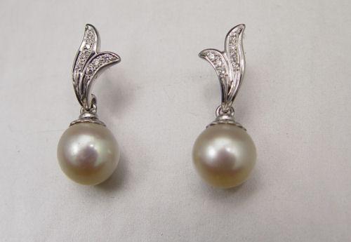 Appraisal: K DIAMOND AND PEARL DROP EARRINGS K white gold earrings