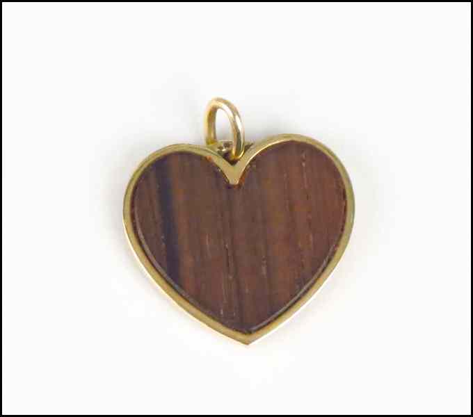 Appraisal: DINH VAN KARAT YELLOW GOLD AND WOOD HEART PENDANT Width