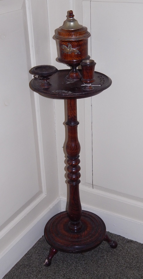 Appraisal: thC pine simulated rosewood smoker's stand the circular top with