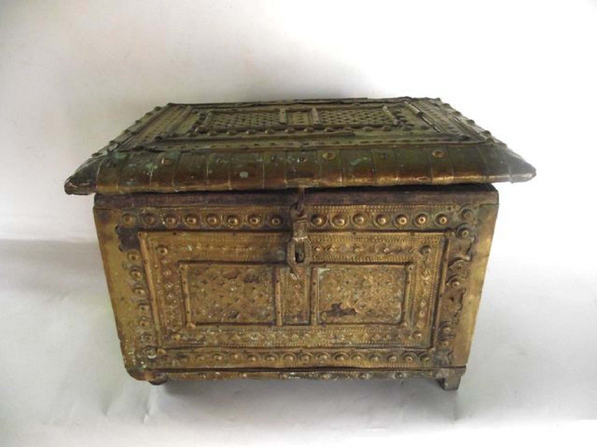 Appraisal: An early brass clad timber casket with extensively studded banded