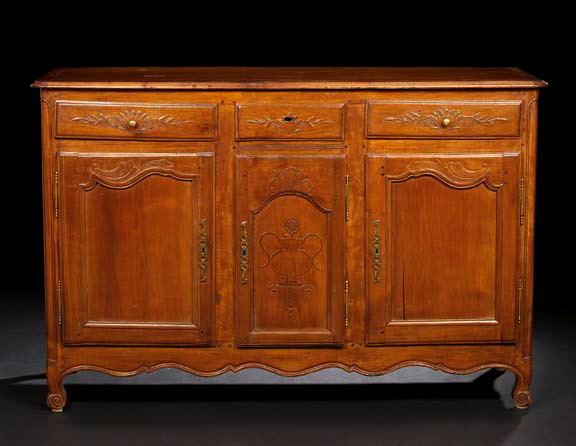 Appraisal: Provincial Louis XV Fruitwood Buffet late th century the long