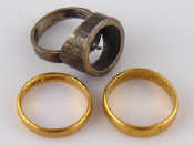 Appraisal: Two carat gold rings one size M mm wide the