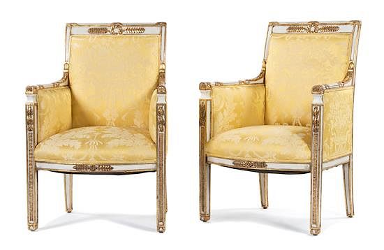 Appraisal: A Pair of Directore Style Parcel-Gilt and Cream-Painted Armchairs A