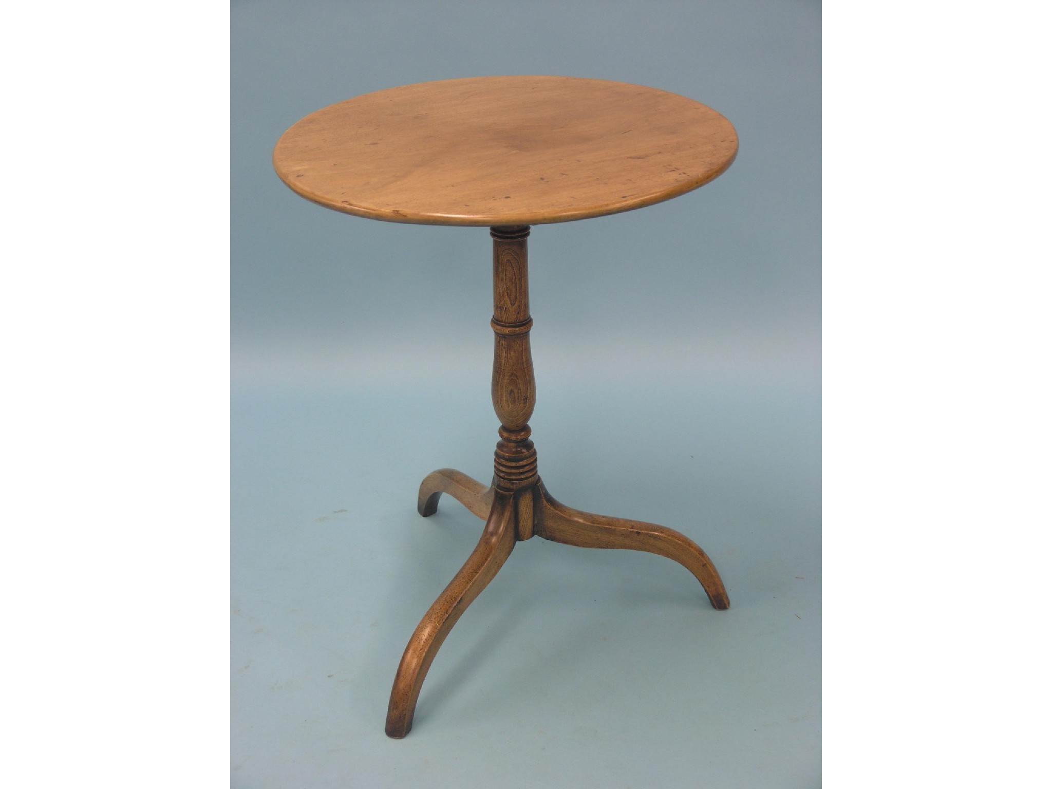 Appraisal: A mid th century mahogany tripod table circular top on