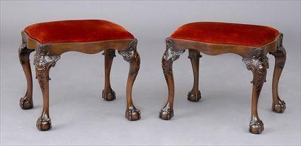 Appraisal: PAIR OF GEORGE III-STYLE CARVED MAHOGANY STOOLS Each serpentine drop-in