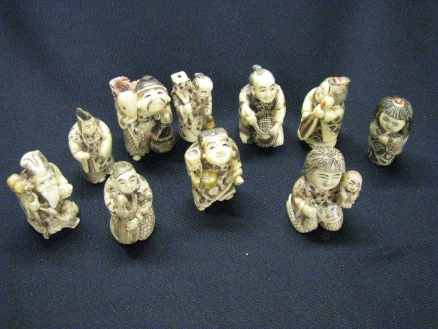 Appraisal: Carved Netsukes of Man Women polychrome trim probably hippo ivory