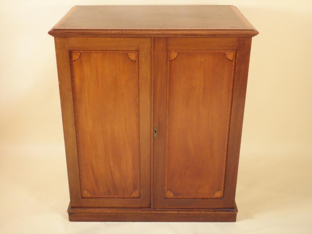 Appraisal: A late thC Sheraton Revival side cabinet with a satinwood