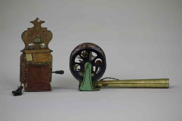 Appraisal: LOT OF TWO PENNY TOYS Includes Squirrel in Cage Whistle