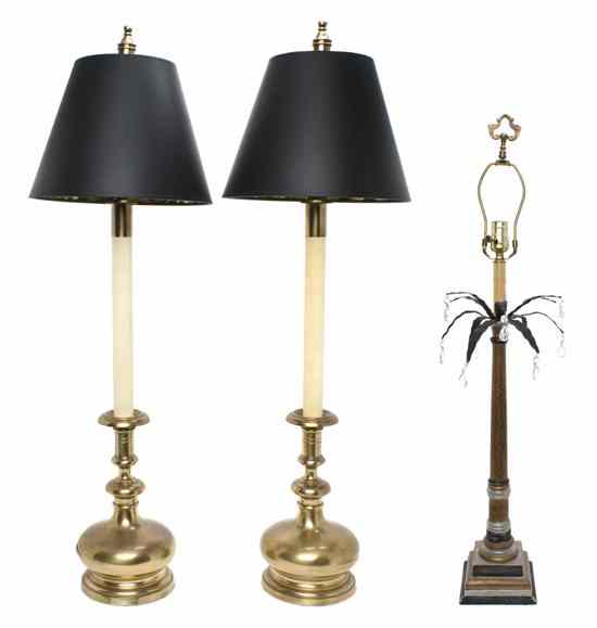 Appraisal: A Pair of Continental Baroque Style Brass Candlestick Lamps having