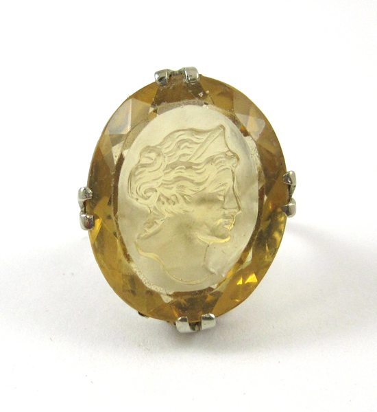 Appraisal: CITRINE AND FOURTEEN KARAT GOLD SOLITAIRE RING The yellow and