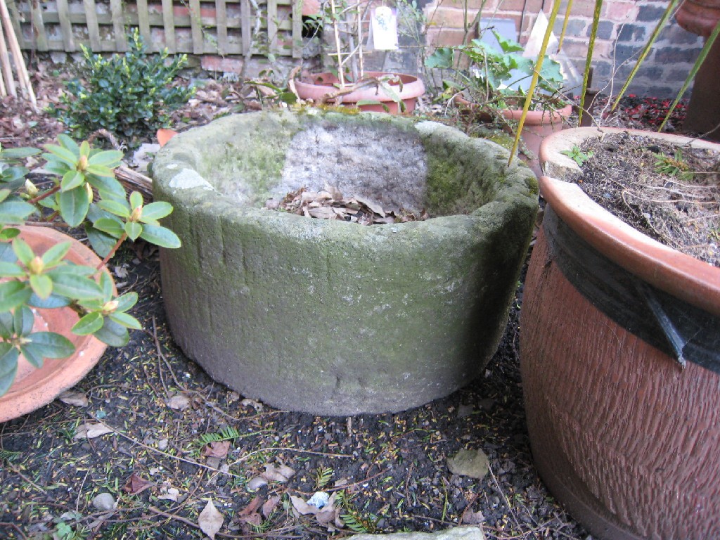 Appraisal: A small circular stone Trough