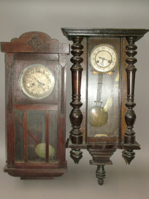 Appraisal: A Continental wooden cased regulator type wall clock the case