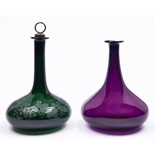 Appraisal: Two green or amethyst glass mell decanters c one engraved