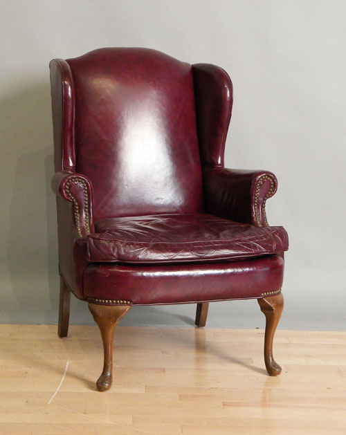 Appraisal: Leather upholstered wing chair