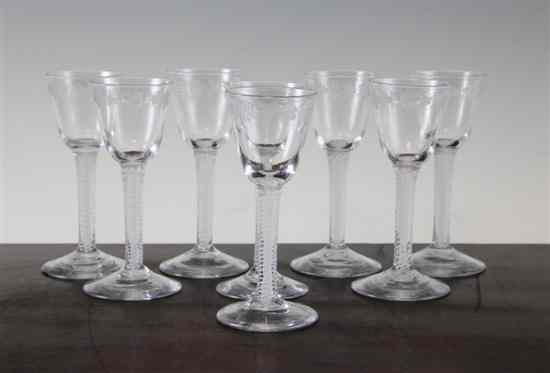 Appraisal: A set of eight George III opaque twist stem wine