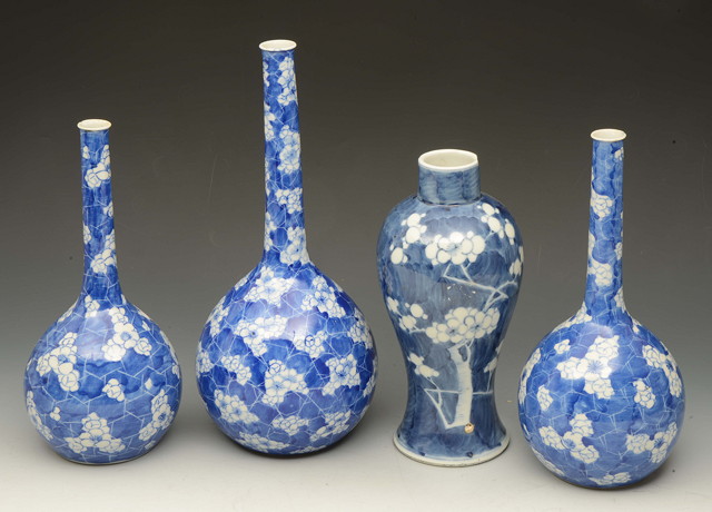 Appraisal: THREE CHINESE BLUE BOTTLE VASES each with prunus decoration largest