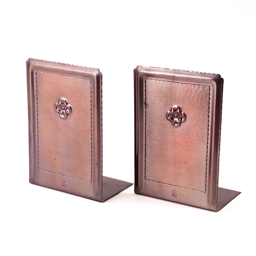 Appraisal: Pair of Roycroft hammered copper bookends each decorated with stylized