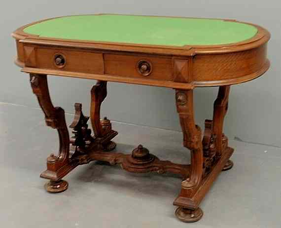 Appraisal: Finely carved Victorian walnut desk c with a green baize