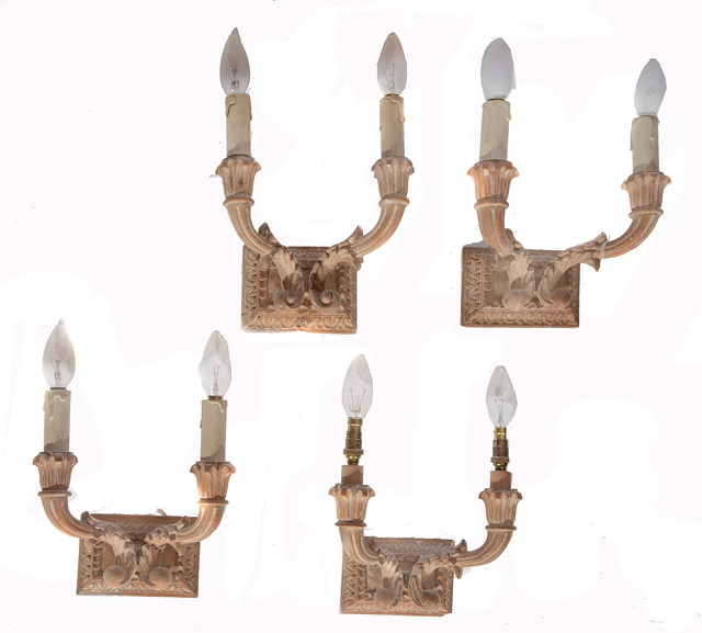 Appraisal: A SET OF FOUR CARVED PINE TWO BRANCH WALL LIGHTS