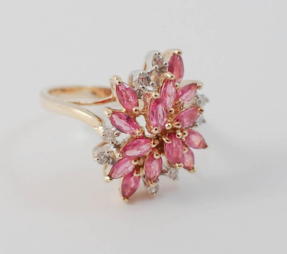 Appraisal: RUBY DIAMOND AND TWO-TONE GOLD CLUSTER RING The k yellow