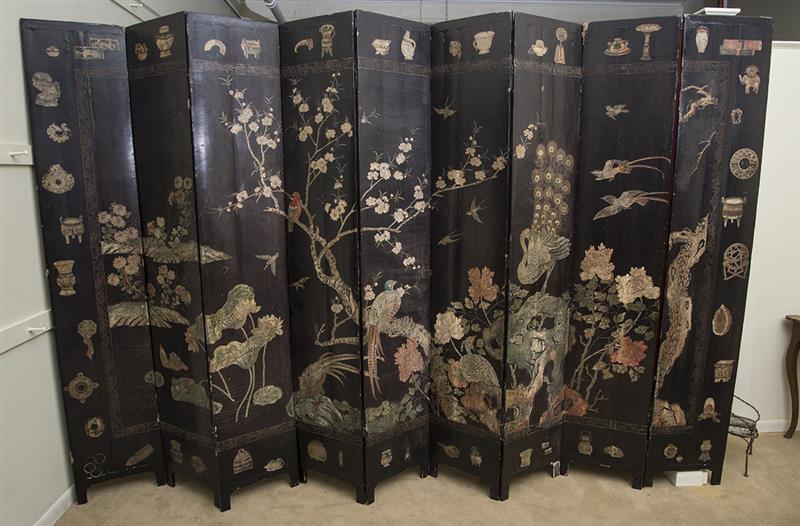 Appraisal: CHINESE CARVED BLACK LACQUER COROMANDEL TWELVE-FOLD SCREEN The front with