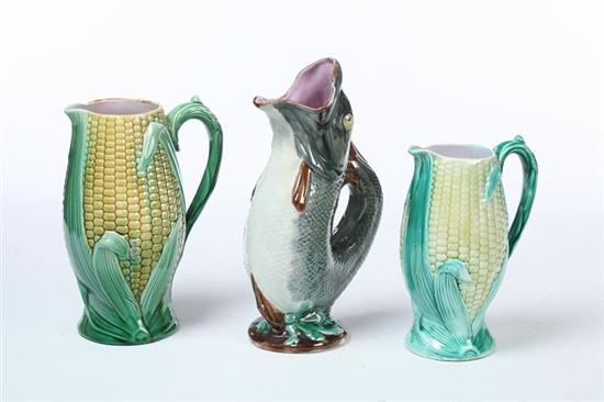 Appraisal: THREE MAJOLICA PITCHERS English nd half- th century Two corn