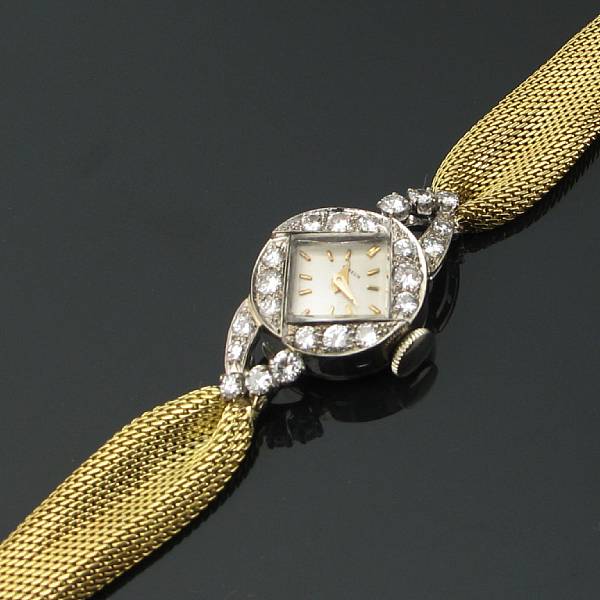 Appraisal: A collection of two ladies diamond and gold mesh bracelet