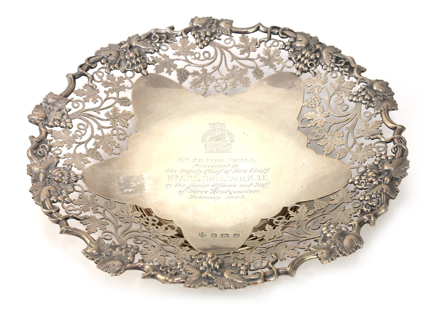 Appraisal: A silver shaped circular pedestal dish the shaped border cast