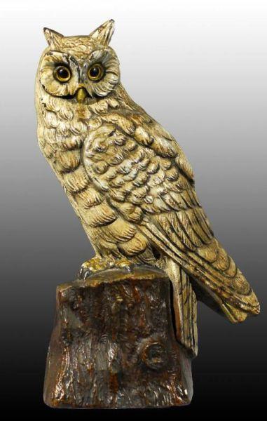 Appraisal: Cast Iron Snowy Owl on Stump Doorstop Description Marked cjo