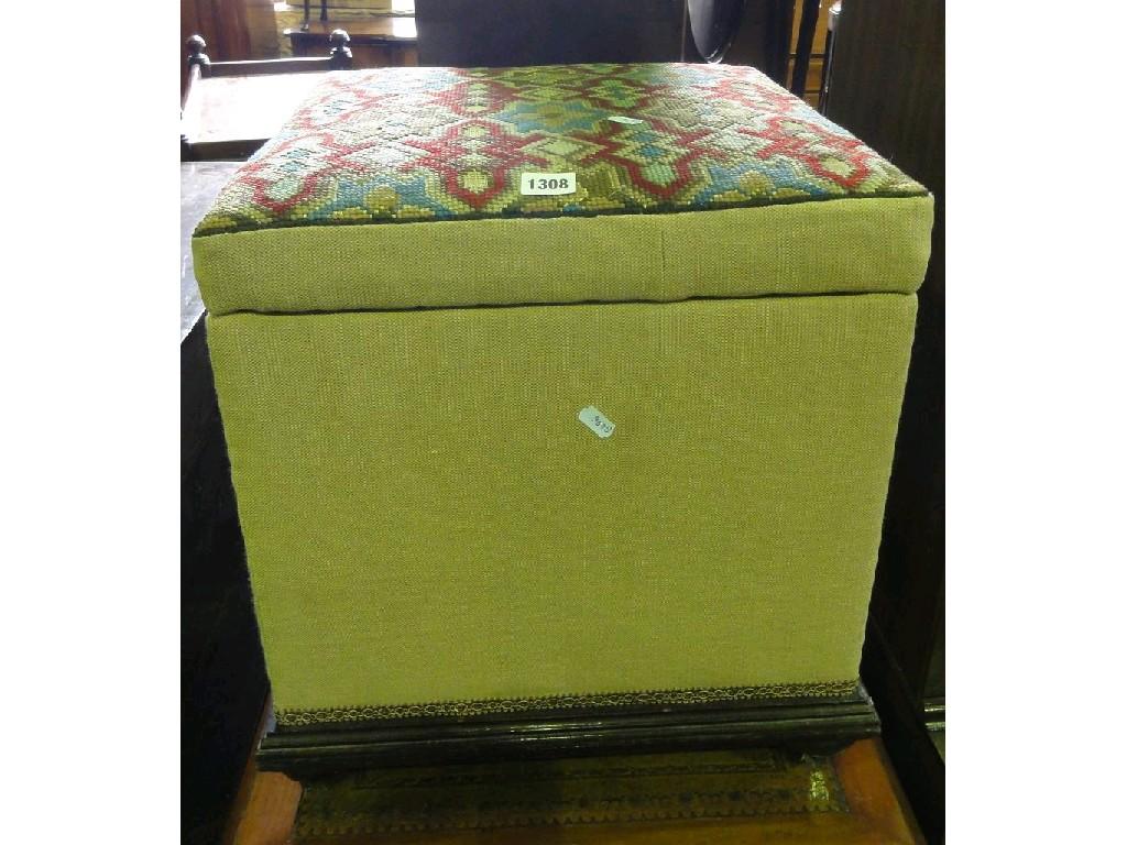 Appraisal: A Victorian box ottoman with upholstered frame and geometric floral