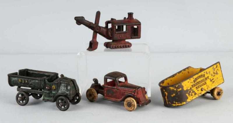 Appraisal: Lot of Cast Iron Vehicle Toys Description American Includes one