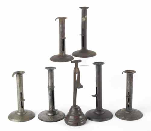 Appraisal: Six hogscraper candlesticks together with a rush light th c