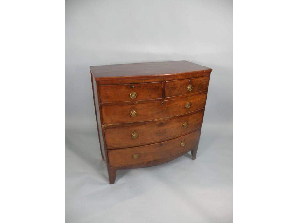 Appraisal: An early thC mahogany bow fronted chest of two short