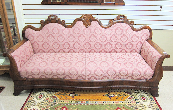 Appraisal: EMPIRE MAHOGANY SERPENTINE-BACK SOFA American mid- th century with later