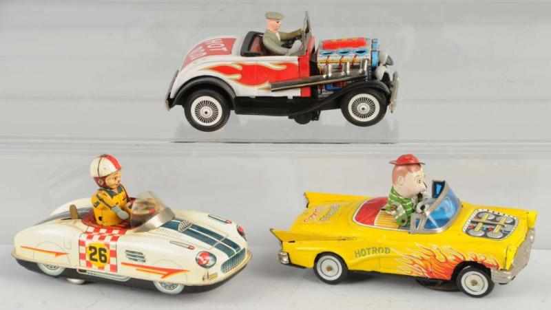 Appraisal: Lot of Tin Hot Rod Vehicle Toys Description Japanese Includes