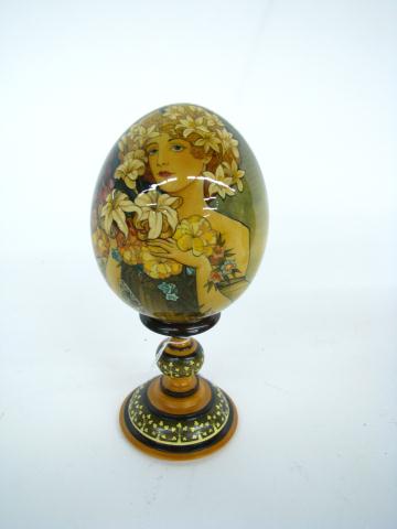 Appraisal: Mucha Influence Wooden Lacquer Papier-Mache Egg depicting woman with irises