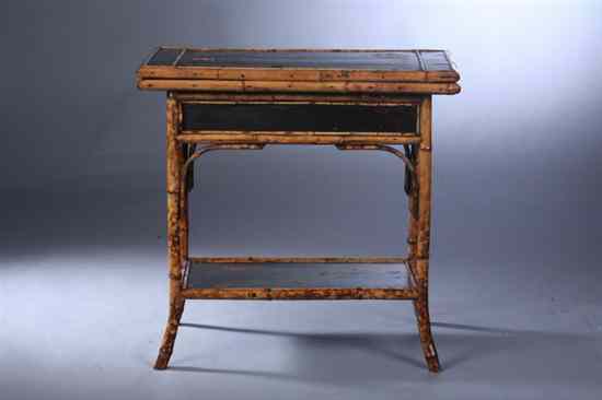 Appraisal: VICTORIAN BAMBOO AND BLACK-JAPANNED FLIP-TOP TABLE th century Flip-top above