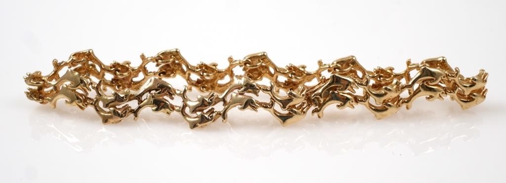 Appraisal: Brilliant K yellow gold double dolphin bracelet Everlasting design Bracelet