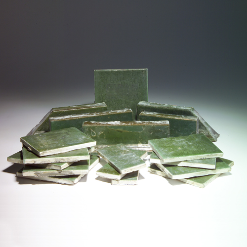 Appraisal: GRUEBY Box lot of matte green tiles and borders of