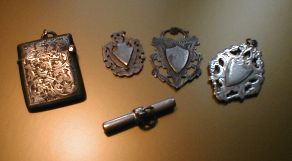 Appraisal: Assorted silver watch fobs etc and a vesta