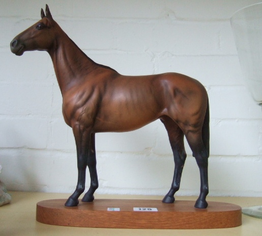 Appraisal: A Beswick race horse Arkle champion steeplechaser mounted on an