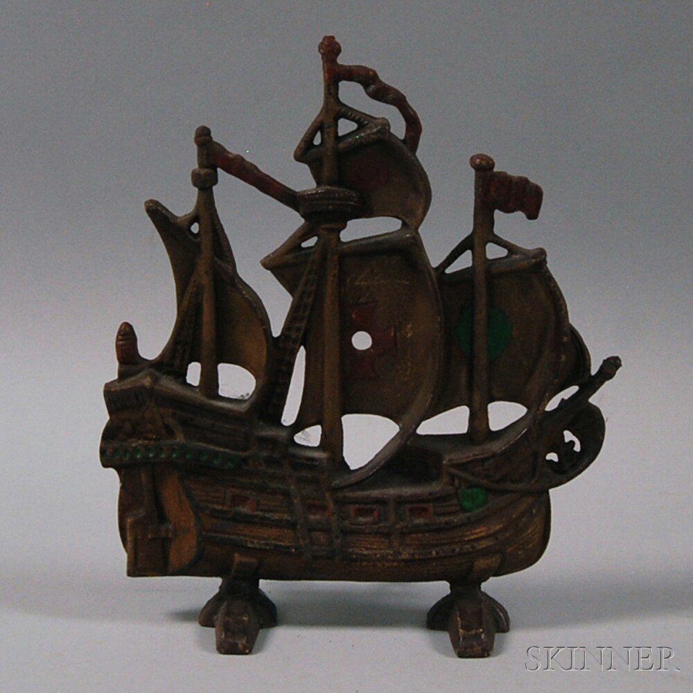 Appraisal: Polychrome-decorated Cast Iron Ship Doorstop early th century red- and