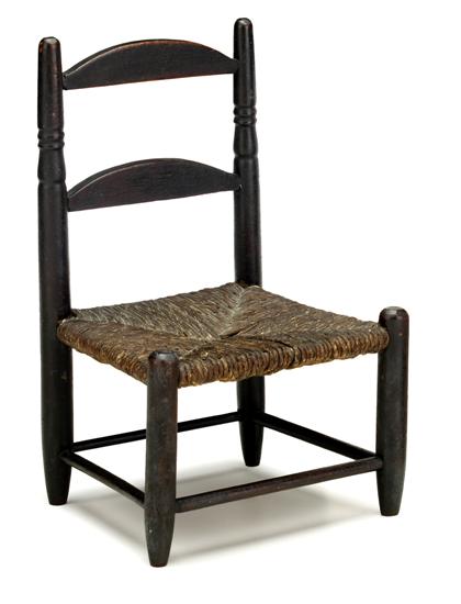 Appraisal: Miniature brown painted rush seated side chair th century